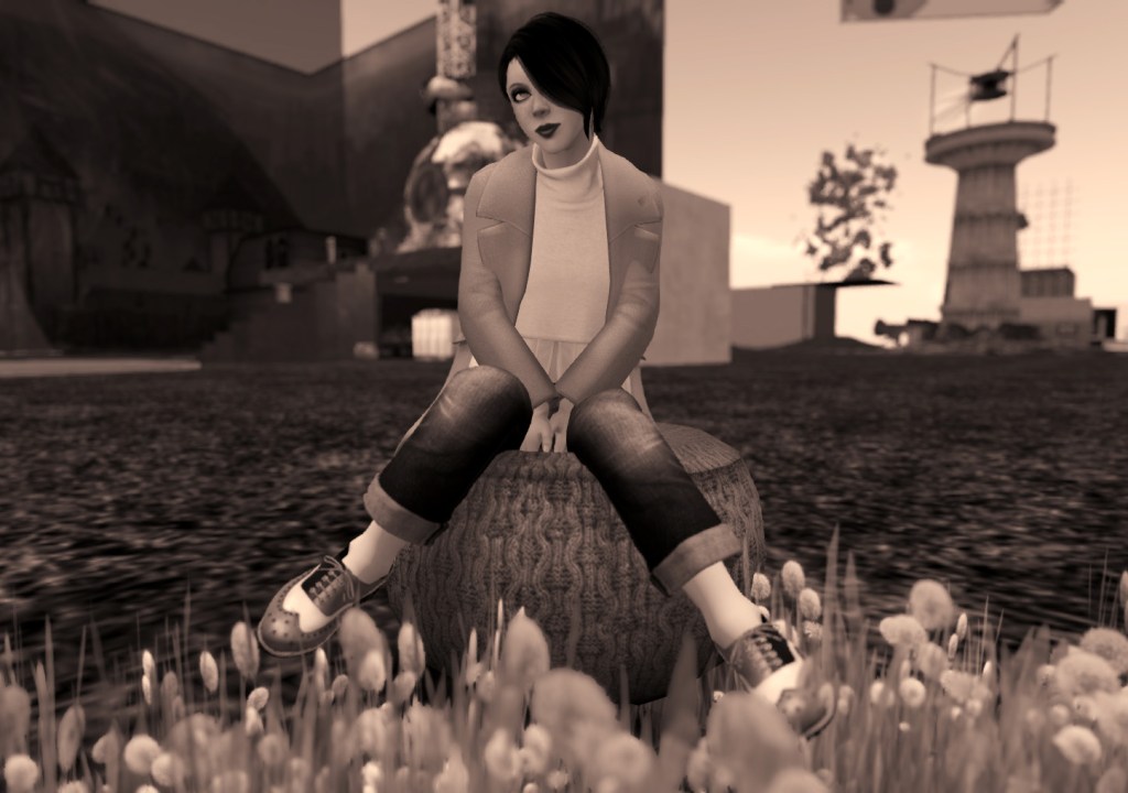 A small clearing with flowers and seating