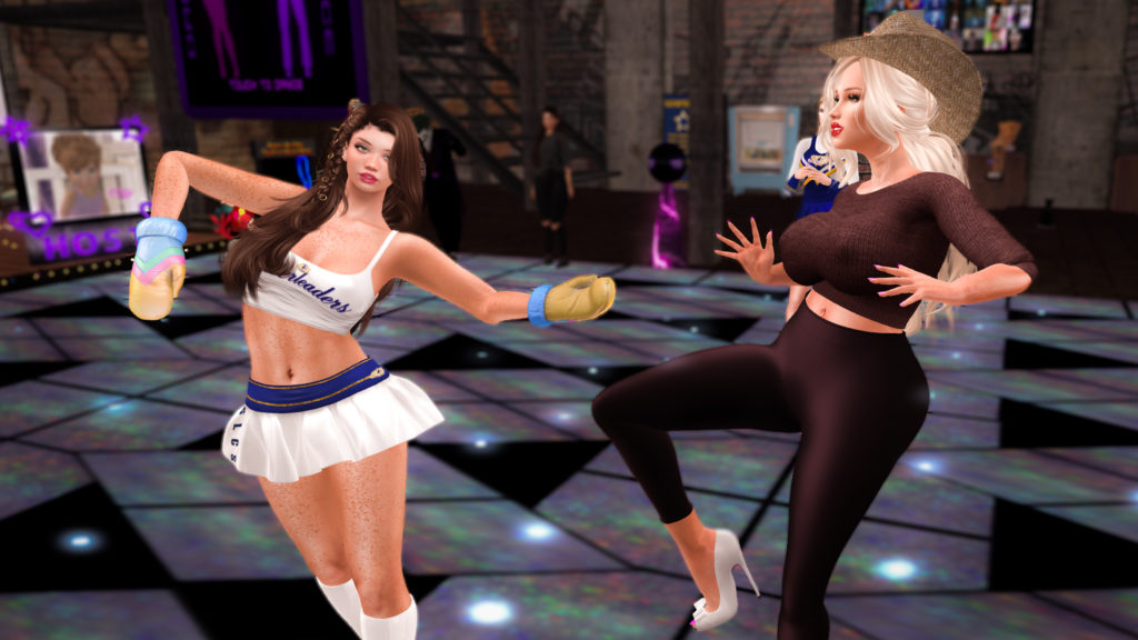 Two avatars dancing in a space in the virtual world Second Life. 