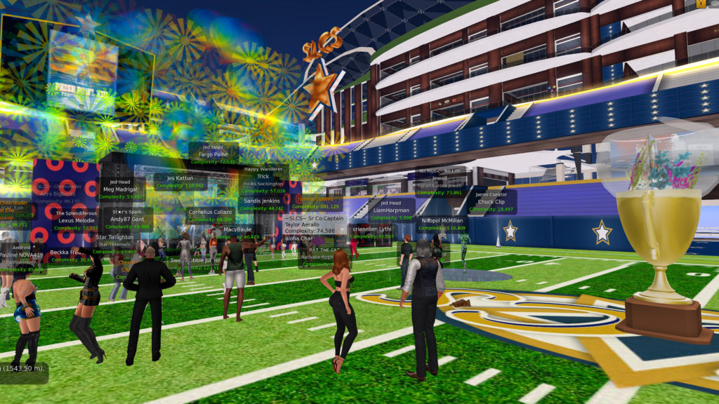 Wide view of the crowd at Phish Bowl XIII at Skytower Stadium in Second Life. At the 50-yard line is the Phish Bowl XIII trophy. Next to the luxury skyboxes in the NE corner of the stadium is a giant "SLCS" logo and Star, both in Gold.