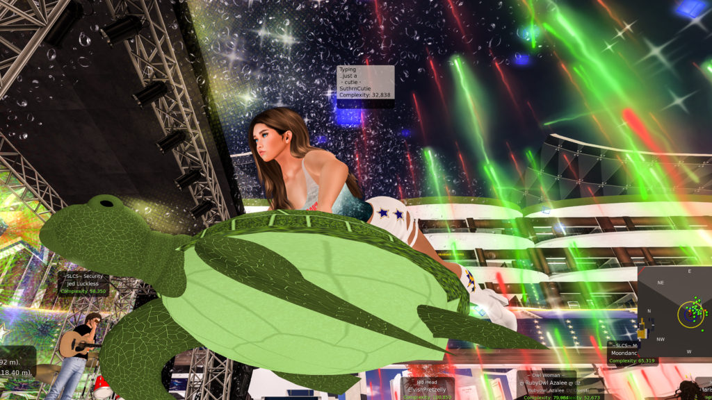 SLCS Cheerleader Cutie riding a large, green turtle through Skytower Stadium in Second Life during Phish Bowl XIII.