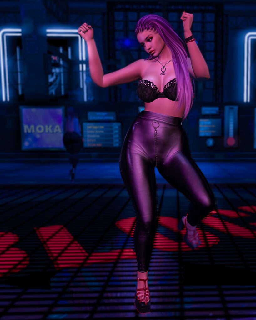 Kate Nova wears a black bra, shiny leggings, and dances energetically at Second Life's Club D-Block